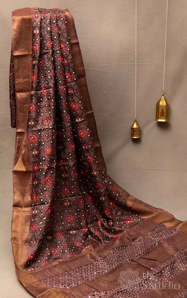 Brown patola printed tussar saree with cutwork pallu