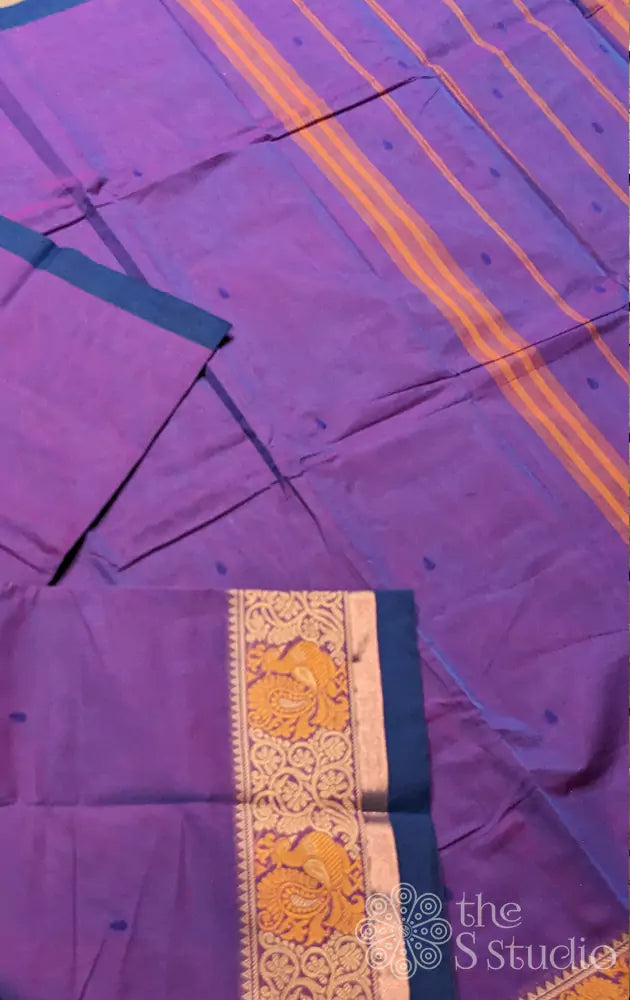 Purple kanchi cotton saree with peacock motifs border