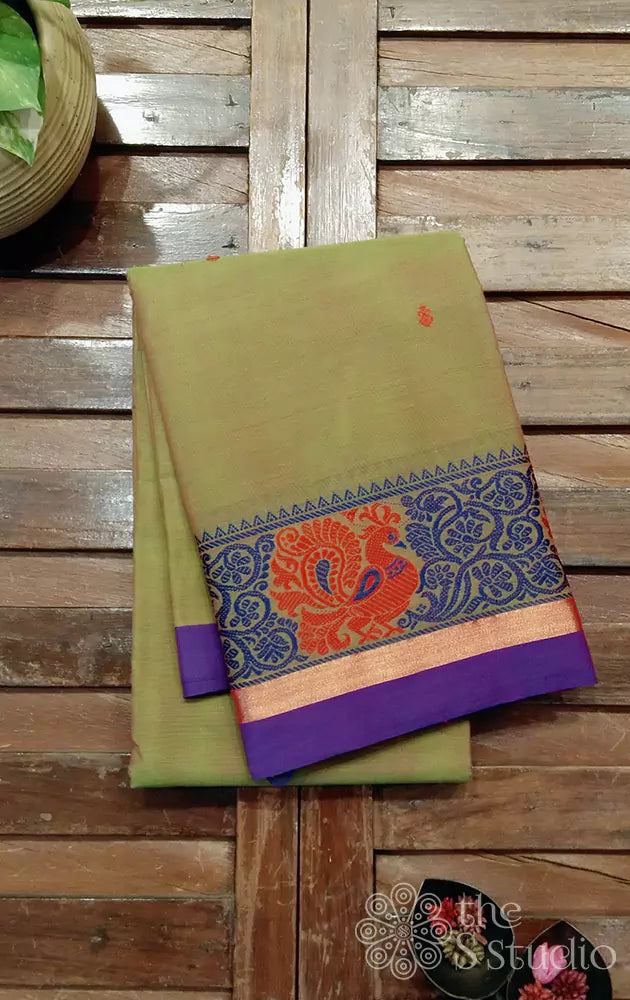 Light green kanchi cotton saree with peacock motif in the border