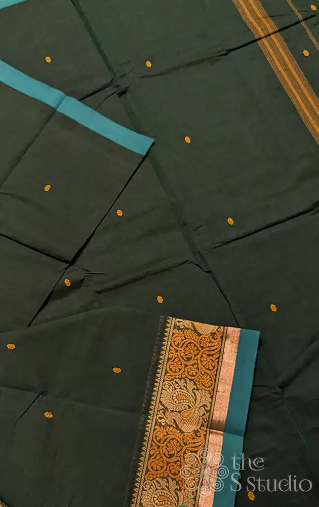 Dark green kanchi cotton saree peacock motif in the border
