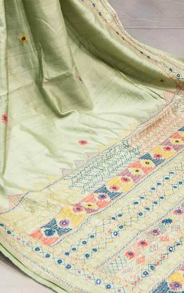 Pastel green tussar saree with multi colour hand embroidery
