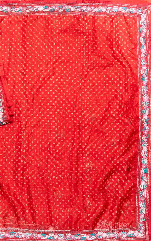 Maroon organza saree with bandhani prints and embroidery border