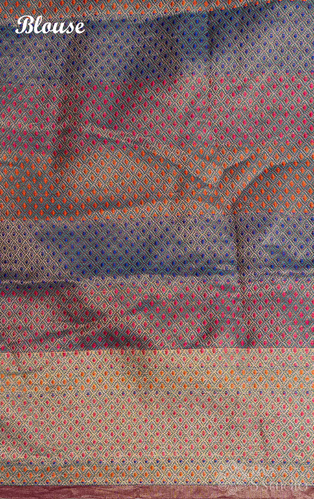 Red bandhani saree with purple border and a brocade pallu