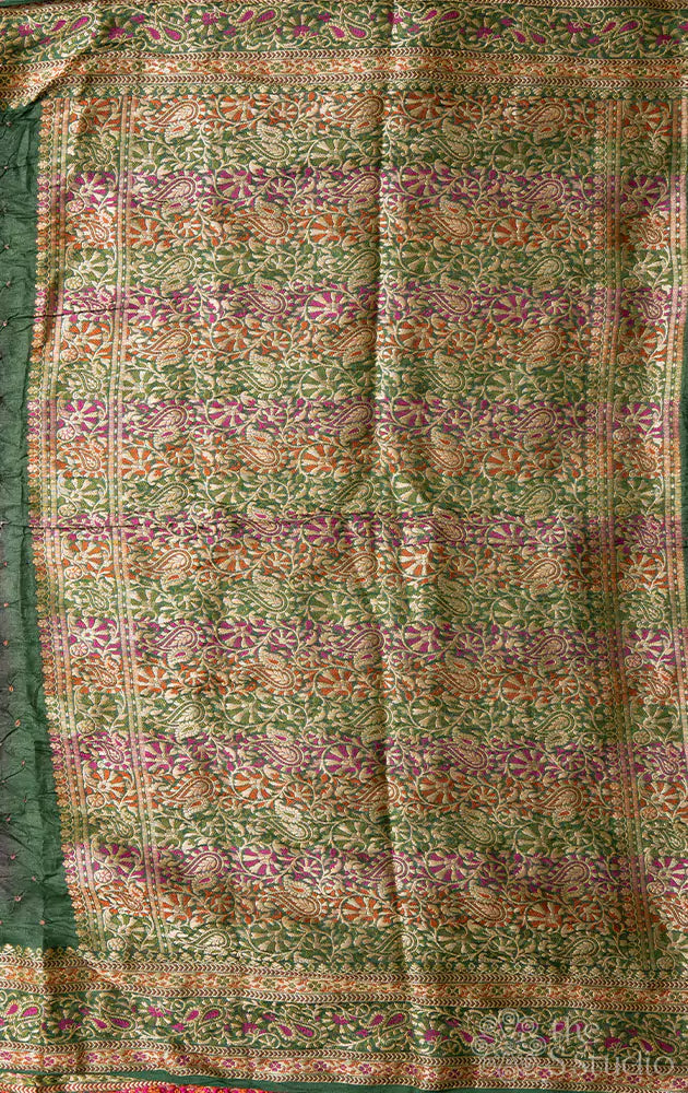 Purple bandhani saree with green border and a brocade pallu