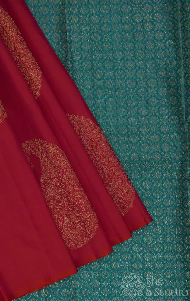 Peach kanchipuram silk saree with woven paisley zari motifs