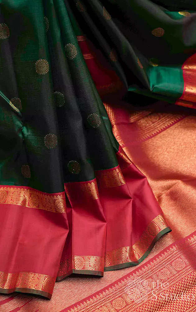 Emerald green kanjivaram silk saree with rettai pet red border