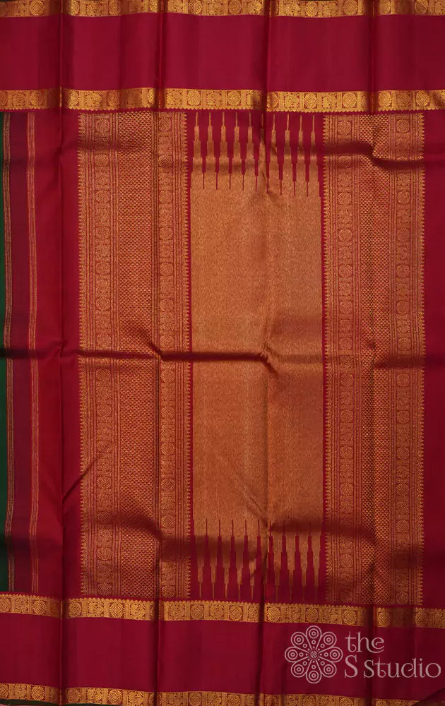 Emerald green kanjivaram silk saree with rettai pet red border