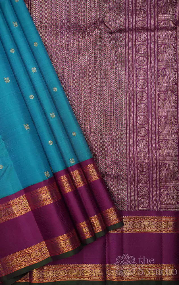 Anandha blue kanjivaram saree with korvai purple border