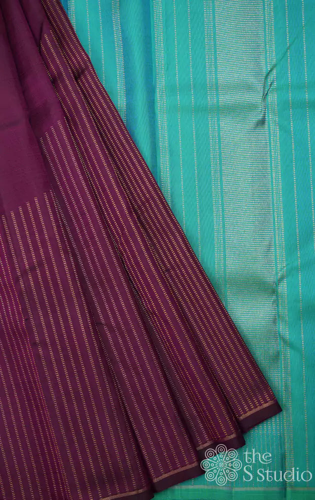 Purple kanjivaram saree with raising vertical zari patterns