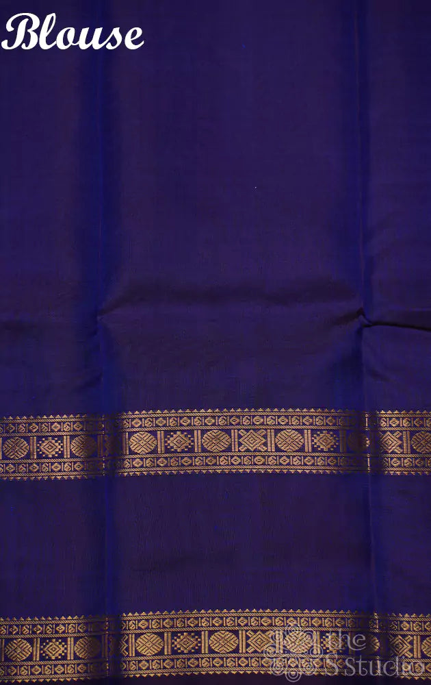 Anadha blue kanchi silk saree with checks and  parrot pallu