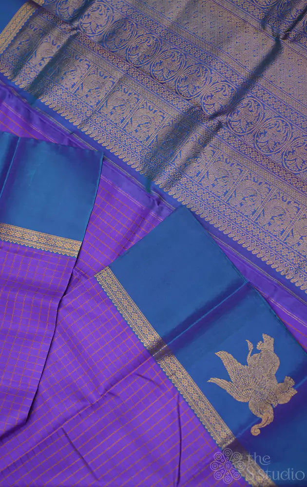 Violet kanchi silk saree with elephant motifs border