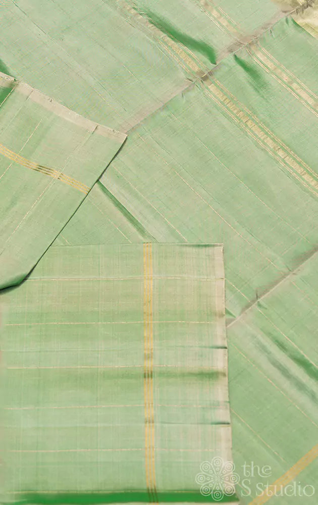 Green plain soft silk saree with zari pallu