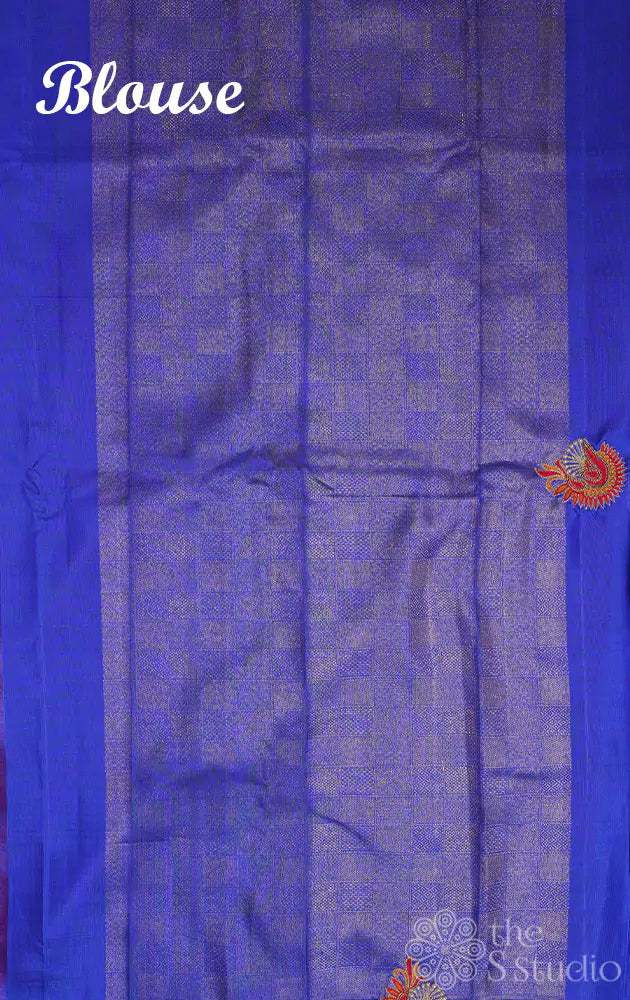 Brilliant red hand embroidered kanchi silk saree with royal blue pallu