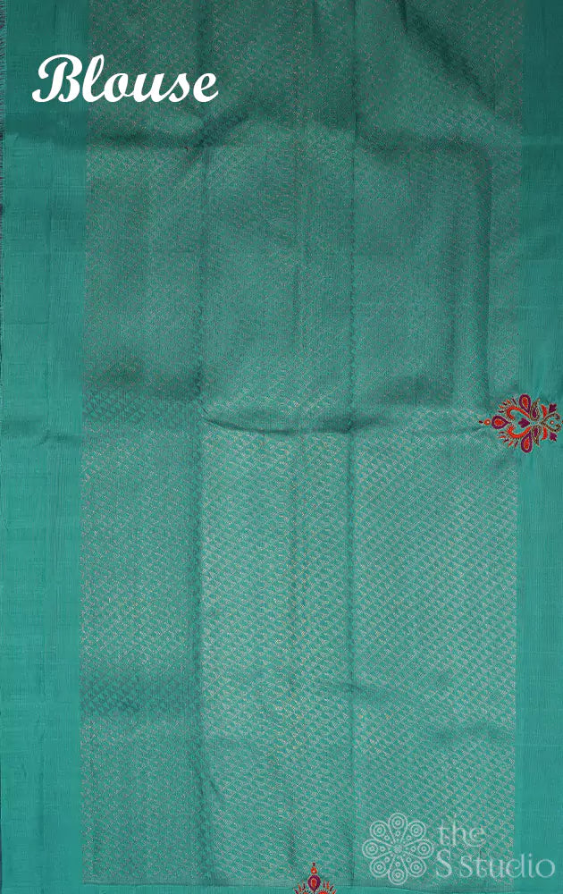 Purple hand embroidered kanchi silk saree with sea green pallu