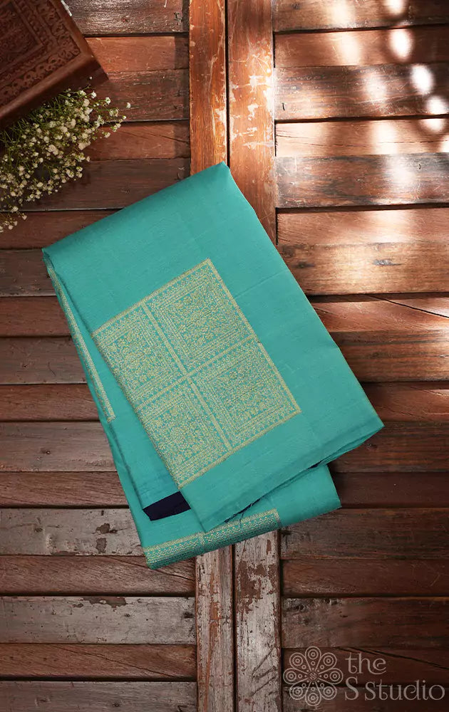 Light blue kanchi silk saree with square zari buttas