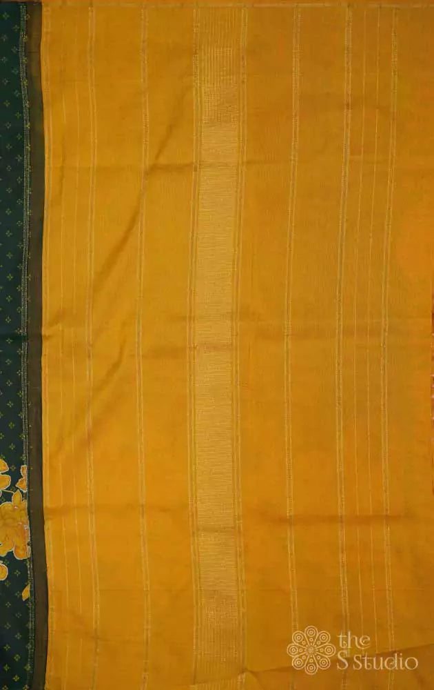 Bottle green kanchi silk saree with mustard floral prints