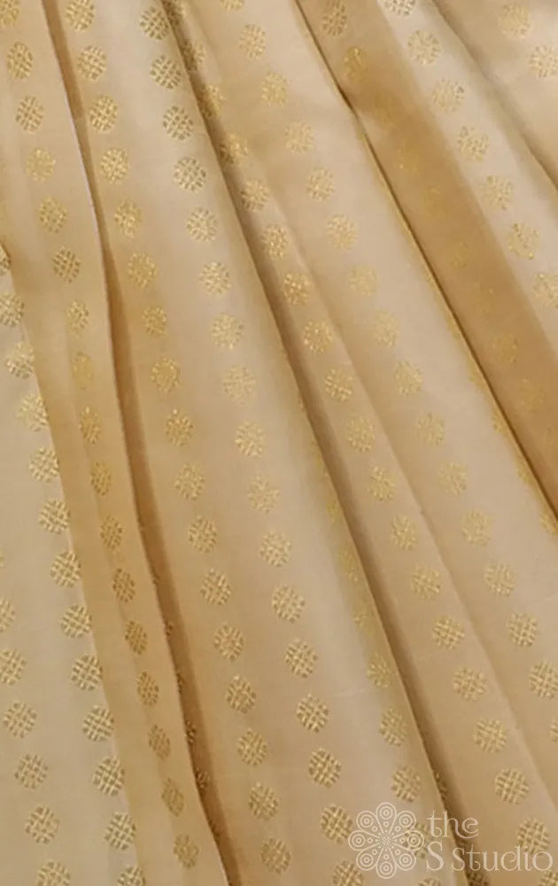 Beige kanchi silk blouse material with small zari buttas