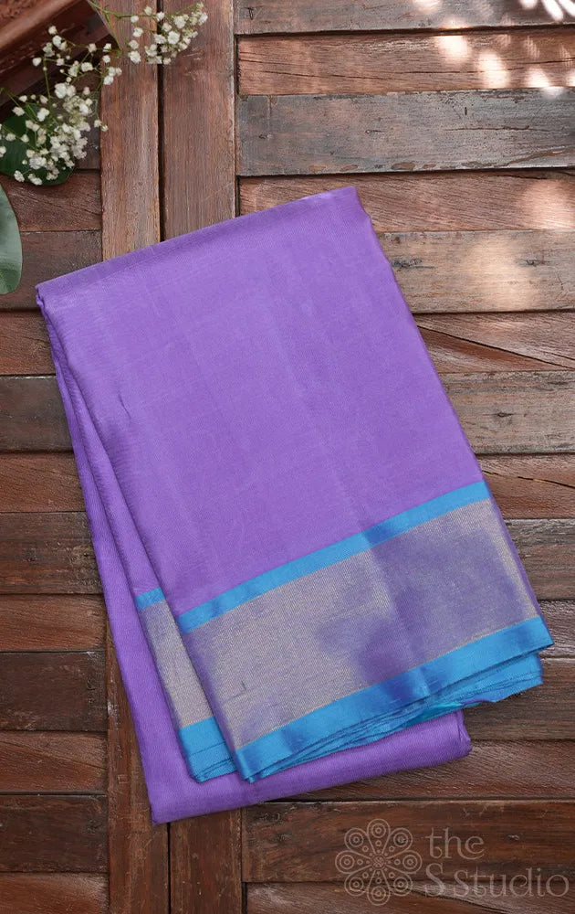 Lavendar kanchi silk saree with blue zari lines pallu