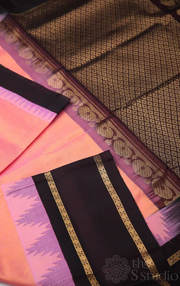 Peach silk cotton saree with temple border
