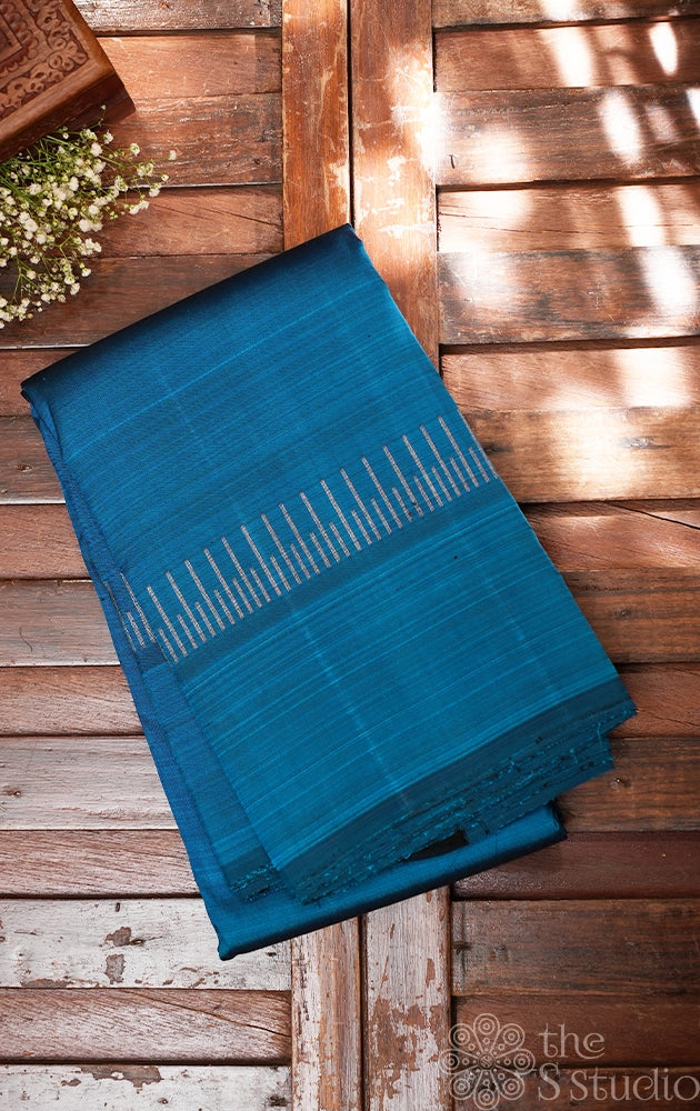 Peacock blue simple kanjivaram saree with zari lines border
