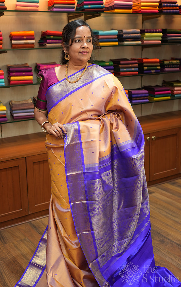 Biscuit brown kanchi silk saree with thread buttas and korvai border