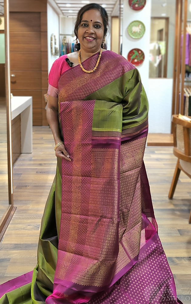 Moss green kanchi pattu saree with purple border