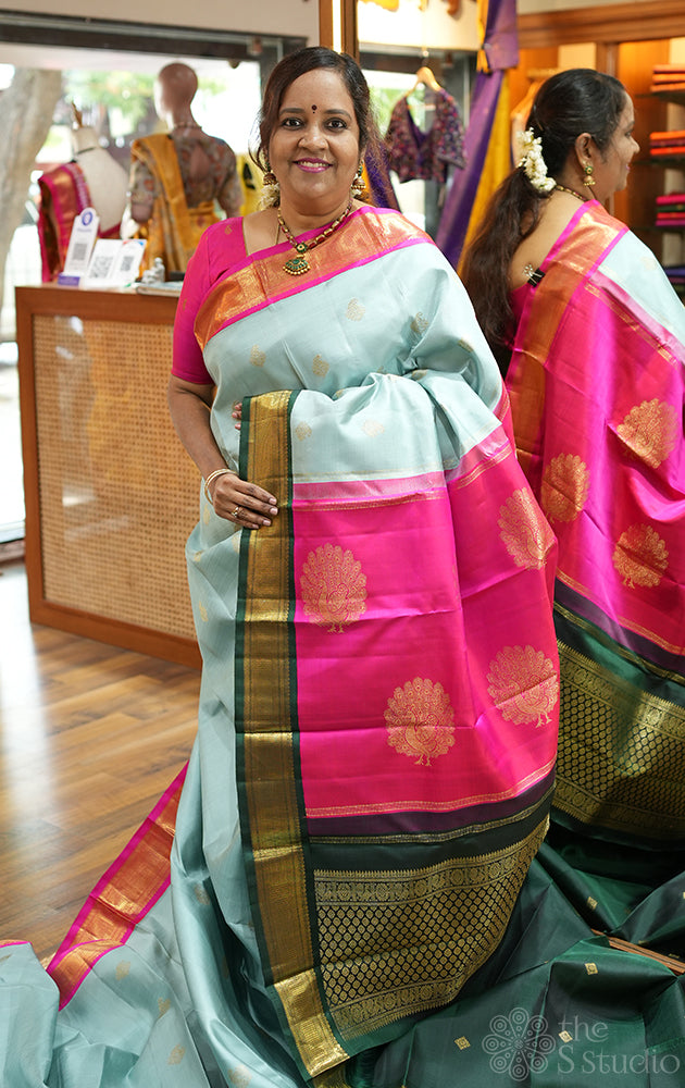Grey kanjivaram silk saree with ganga jamuna korvai borders