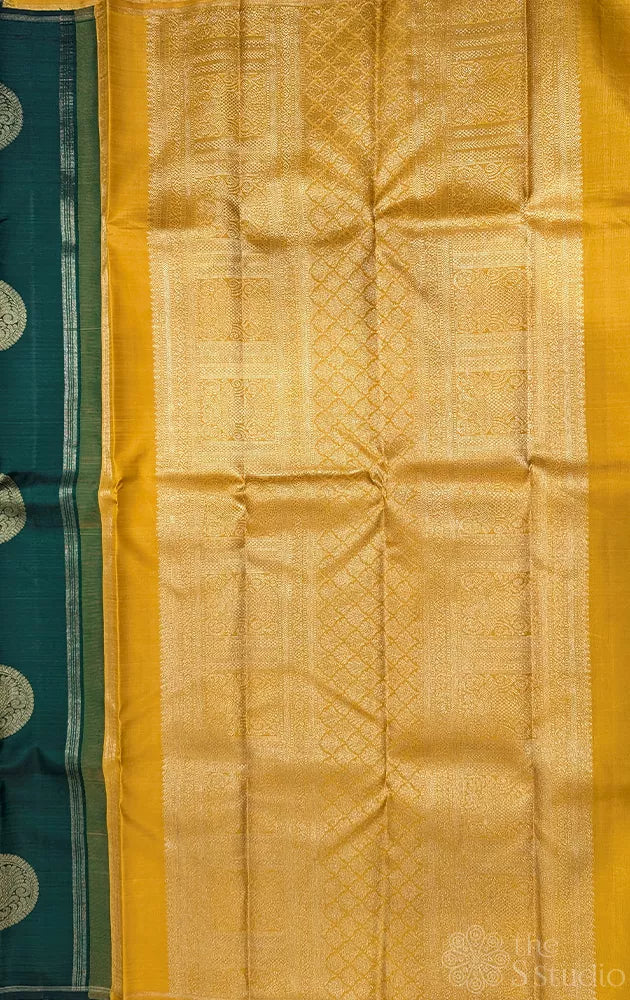 Bottle green kanjivaram silk saree with mustard pallu