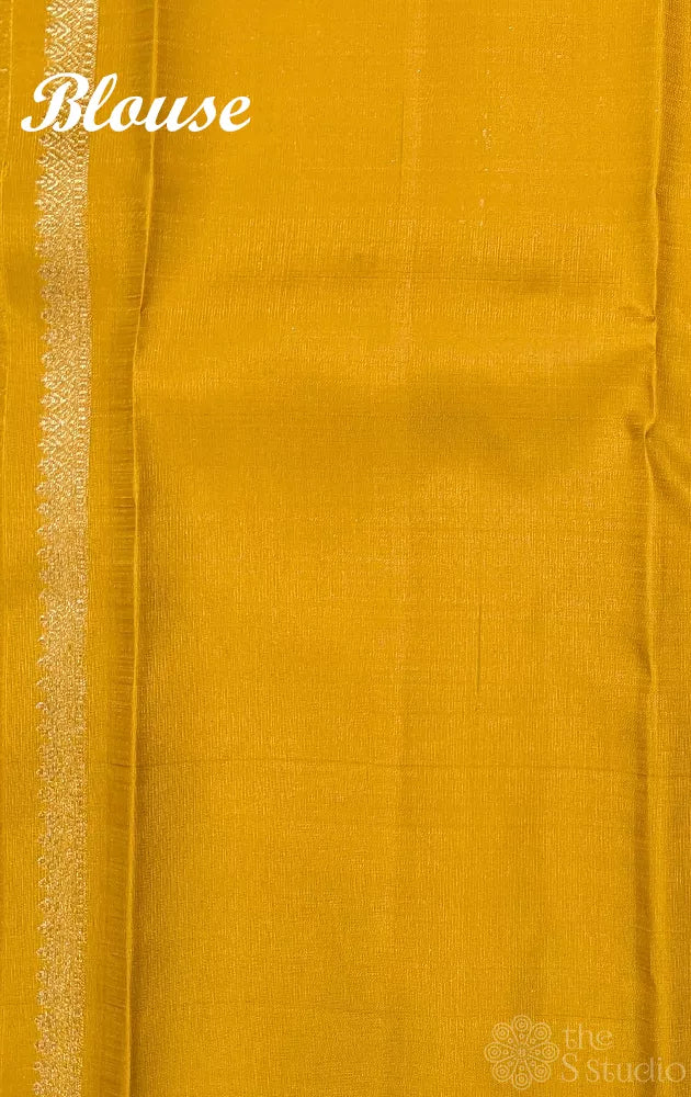 Bottle green kanjivaram silk saree with mustard pallu