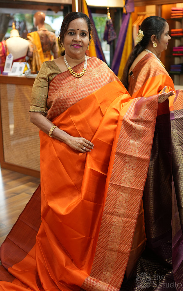 Burnt Orange kanchipuram silk saree with maroon border