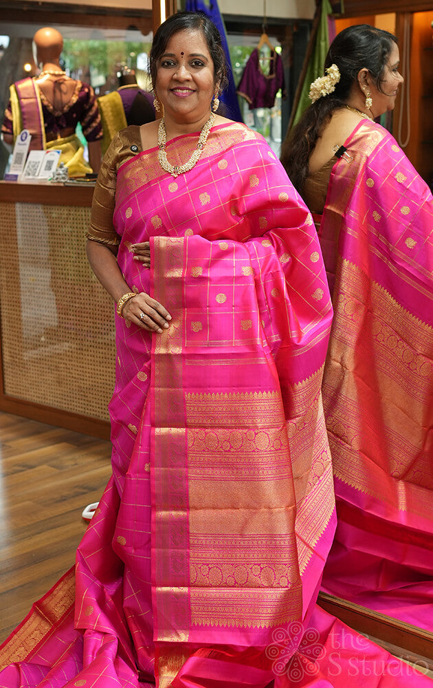 Rani pink kanjeevaram silk saree with zari checks
