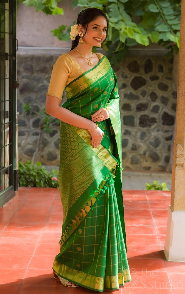 Leaf green kanjivaram silk saree with zari checks and meenakari  buttas