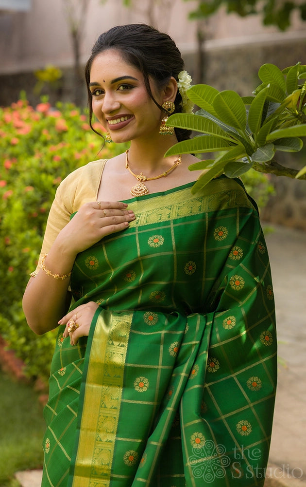 Leaf green kanjivaram silk saree with zari checks and meenakari  buttas