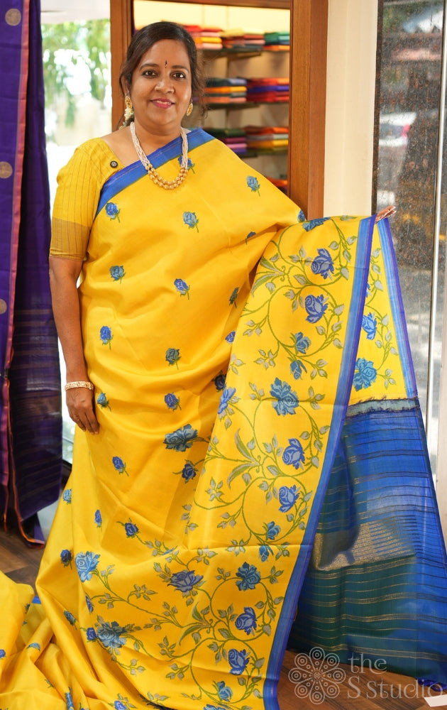 Yellow digital printed kanchipuram silk saree with peacock blue pallu