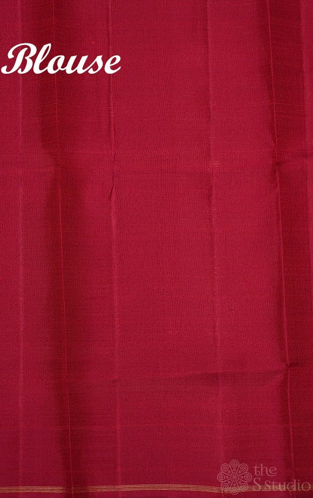 Elachi green kanchipuram silk saree with prints and a maroon pallu