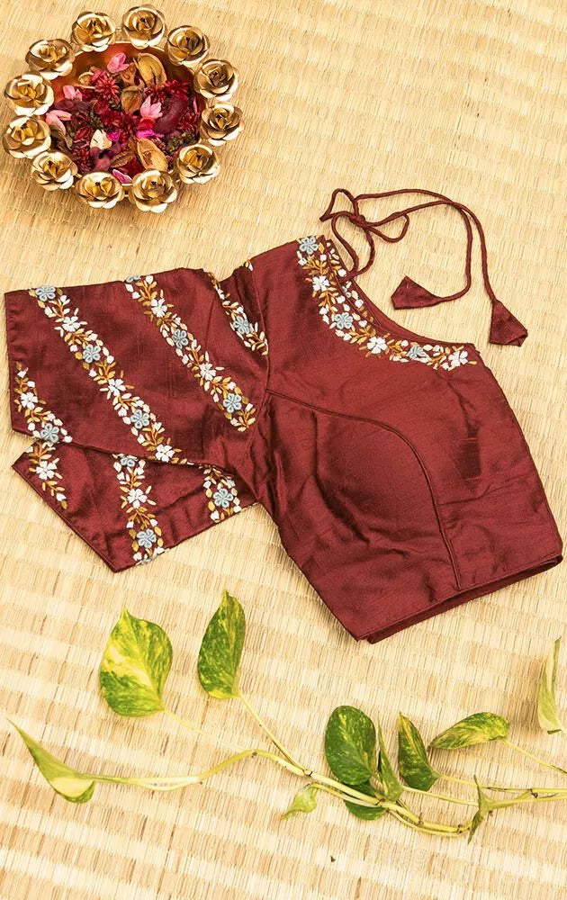 Maroon hand  embroidered raw silk blouse with rounded v neck pattern