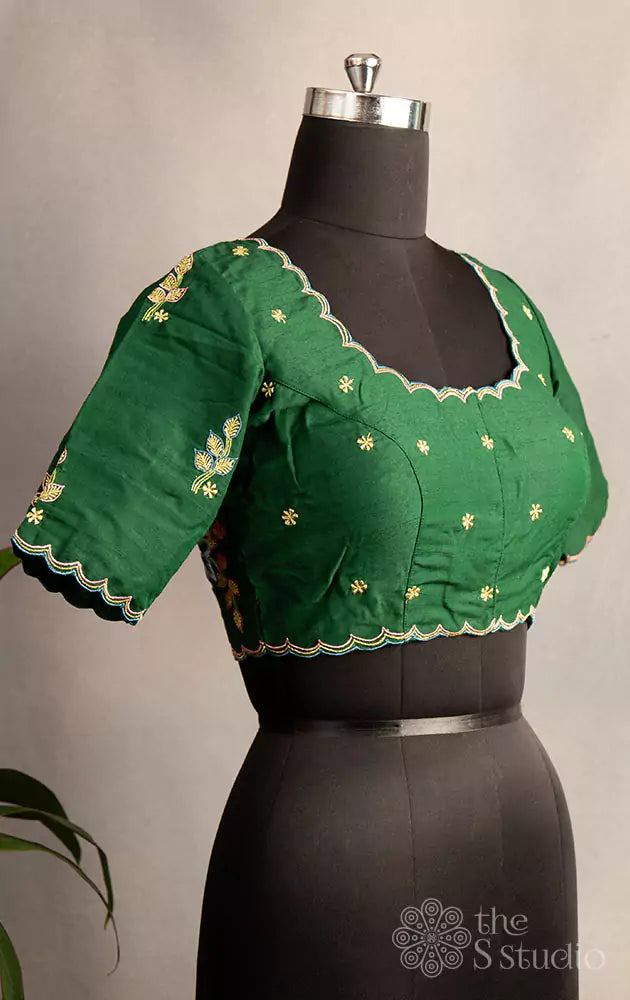 Green hand embroidered cotton blouse with scallop neck pattern