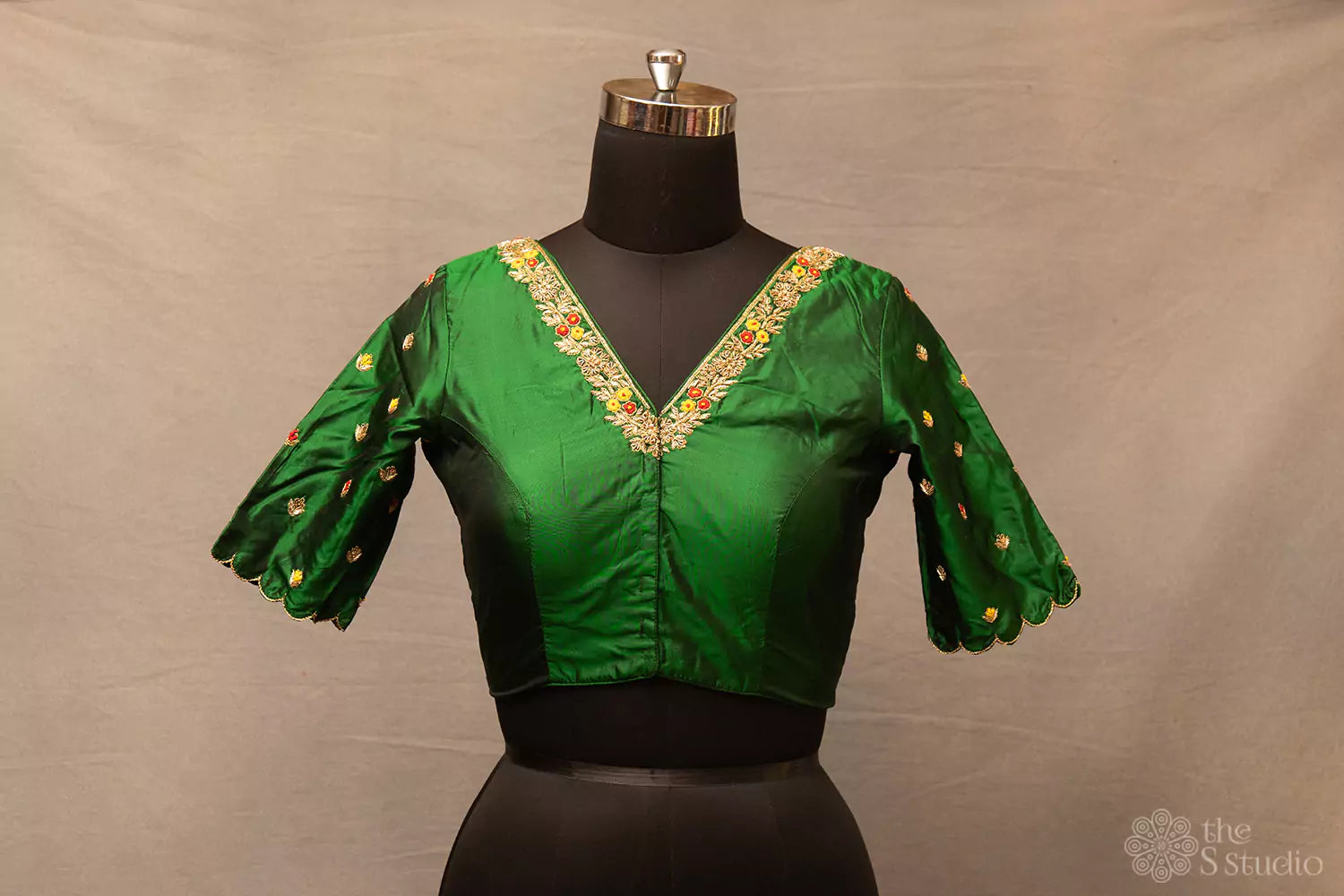 Green hand embroidered silk blouse with neck pattern