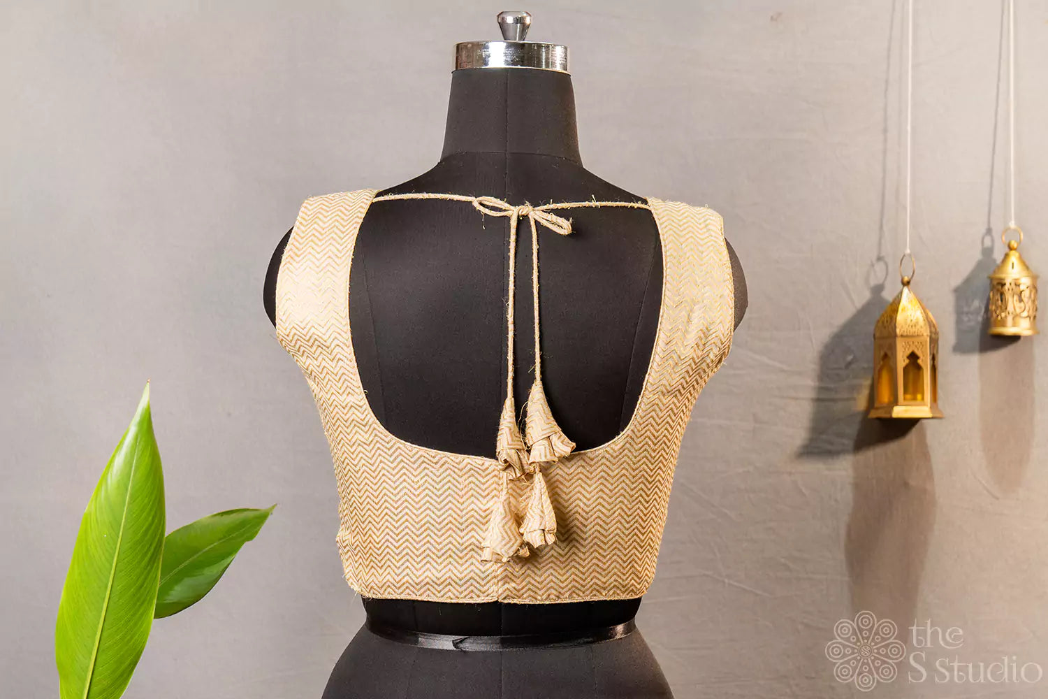 Golden beige sleeveless semi silk  readymade blouse with zig zag lines