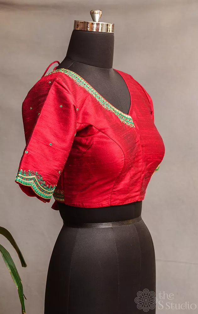 Red raw silk readymade blouse with aari work embroidery