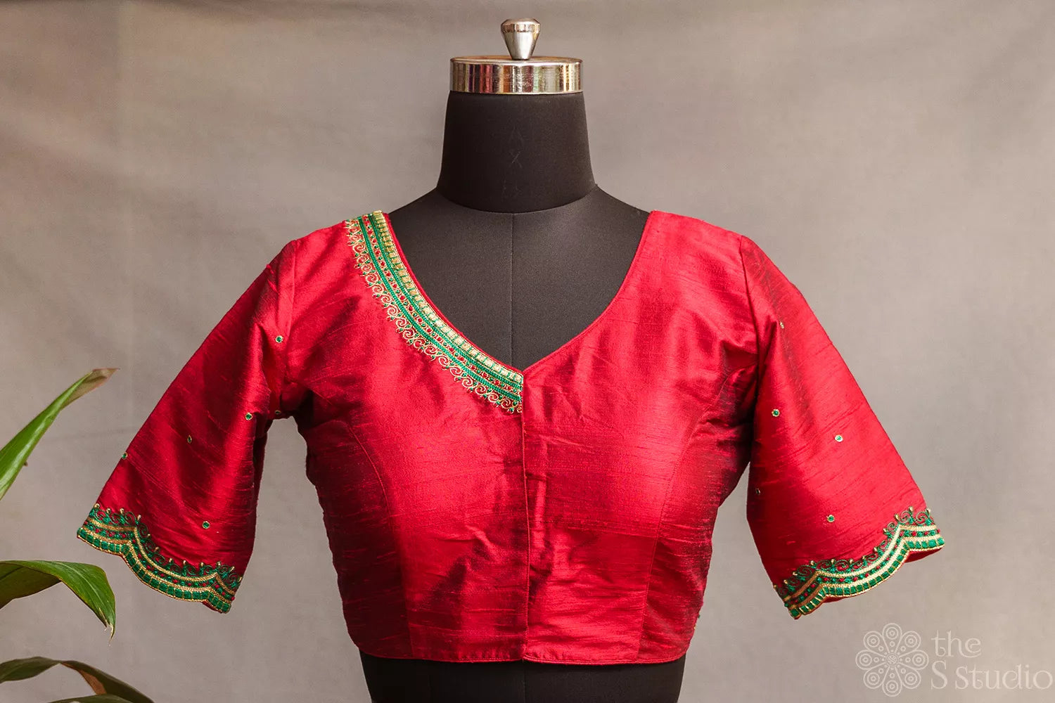 Red raw silk readymade blouse with aari work embroidery