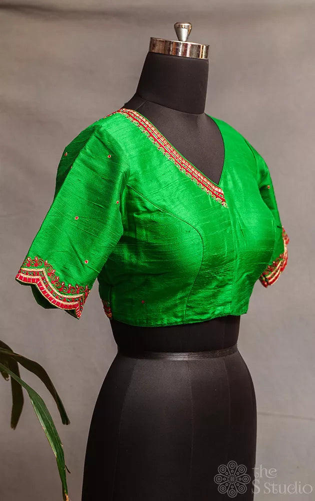 Green raw silk readymade blouse with aari work embroidery