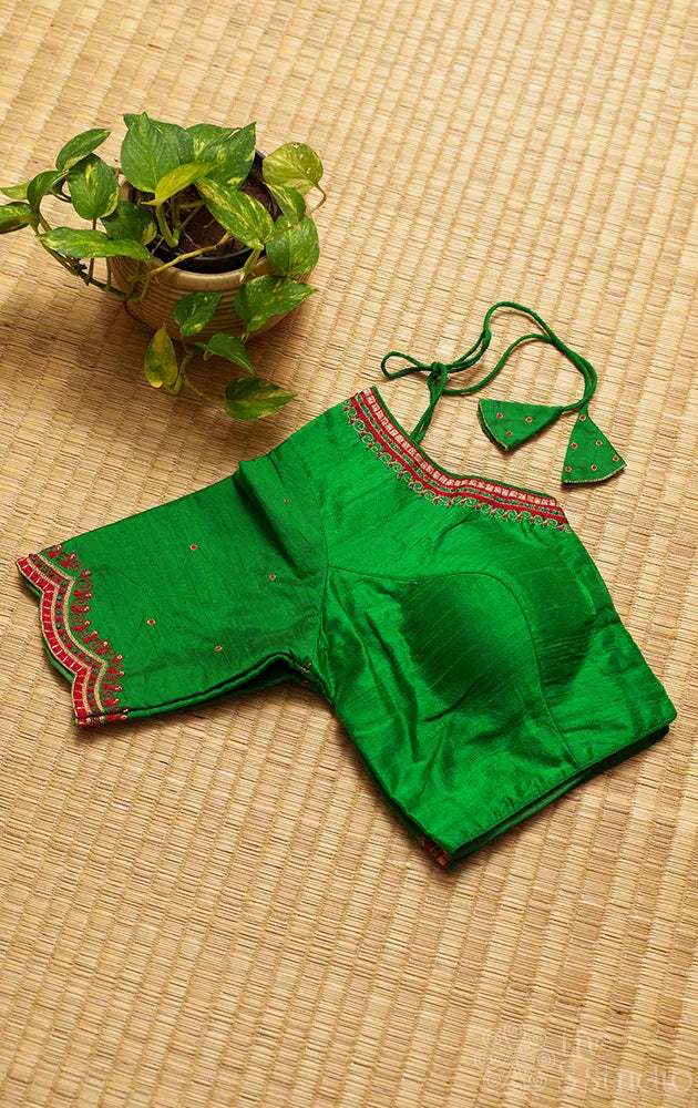 Green raw silk readymade blouse with aari work embroidery