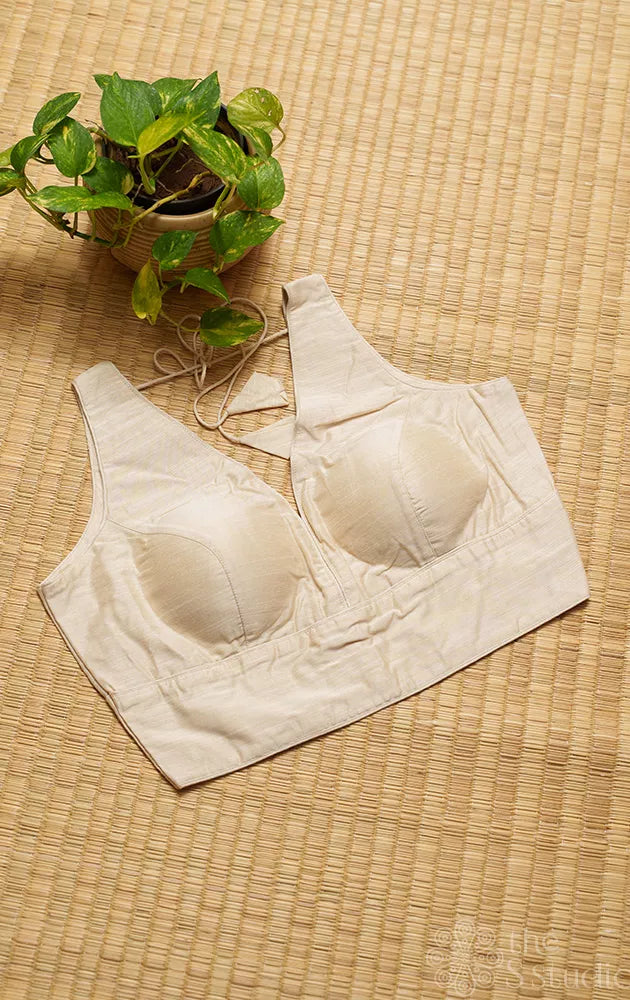 Off white cotton sleeveless readymade blouse