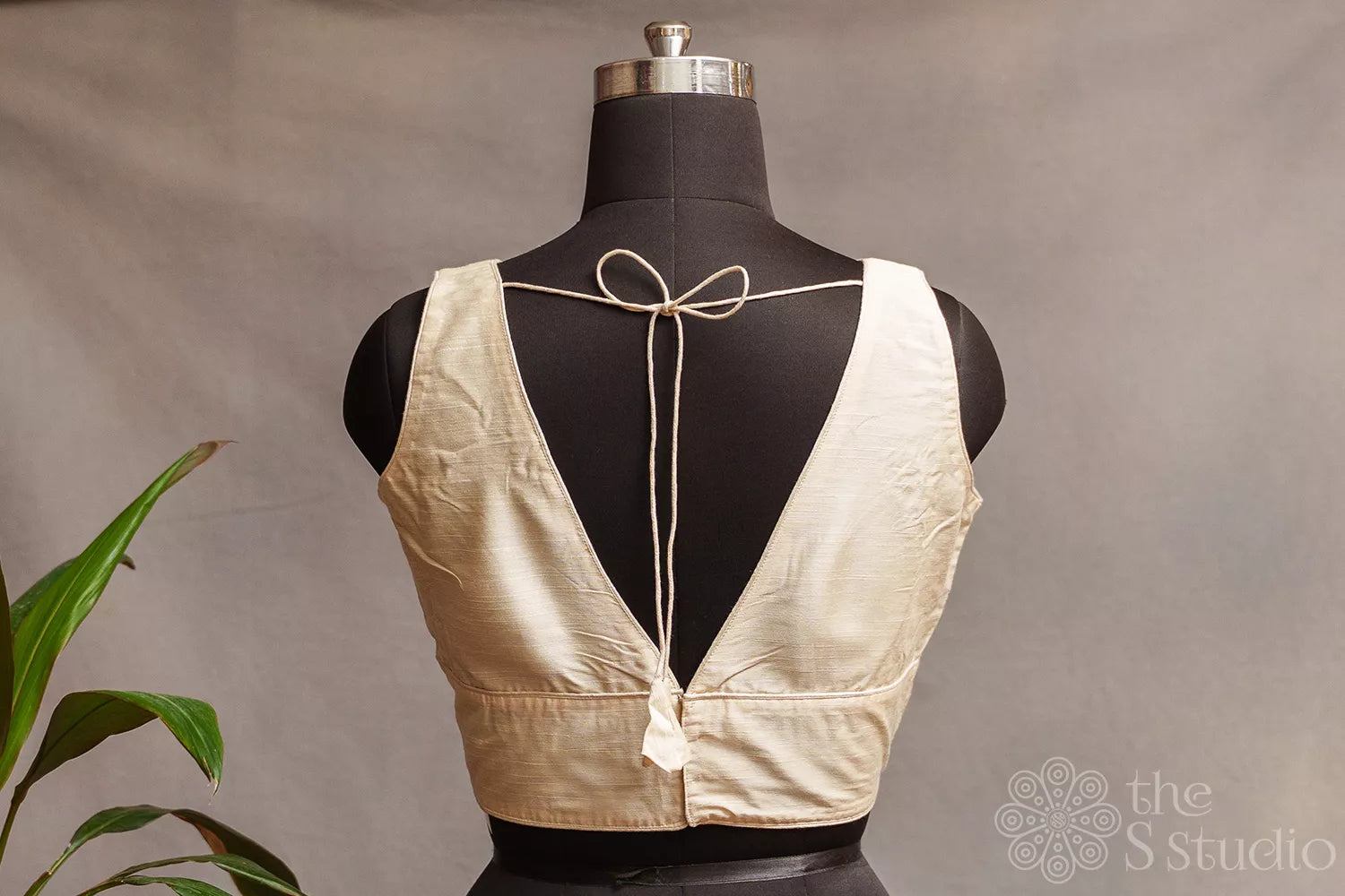Off white cotton sleeveless readymade blouse
