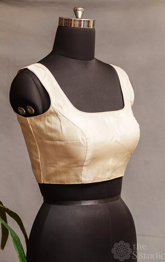 Off white tissue sleeveless readymade blouse