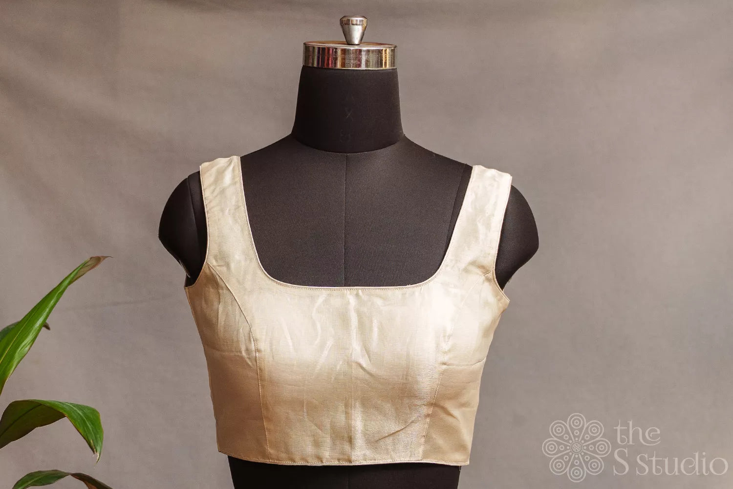 Off white tissue sleeveless readymade blouse