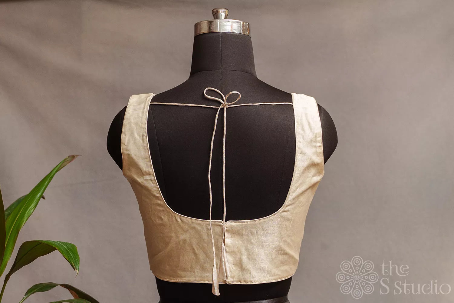 Off white tissue sleeveless readymade blouse