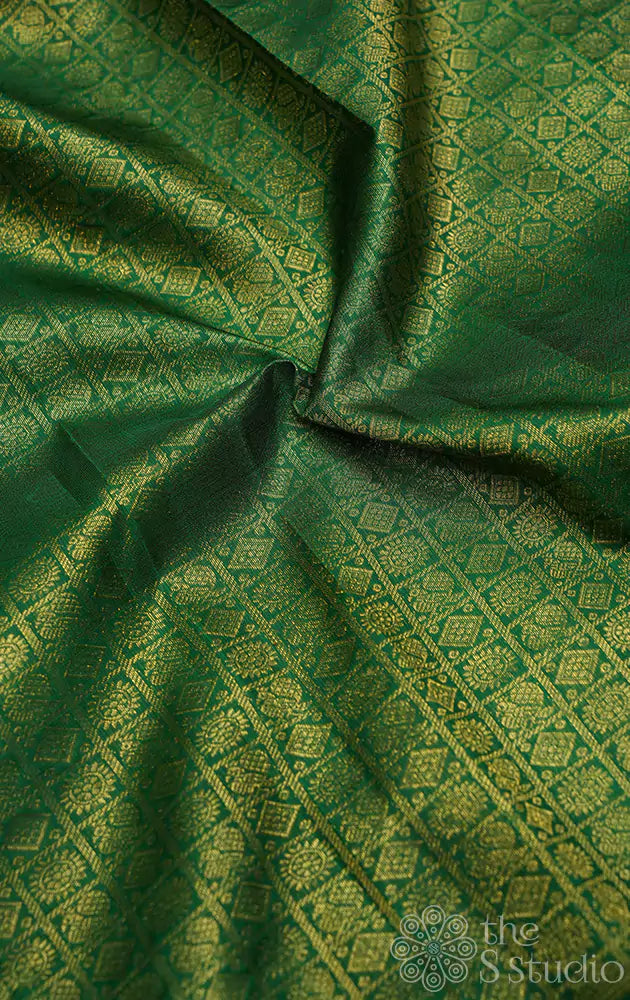 Green kanchi silk blouse material with mayil chakram buttas