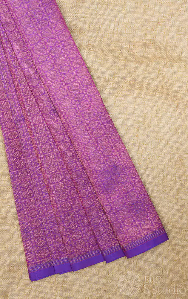 Purple kanchi silk blouse fabric with mayil chakram buttas